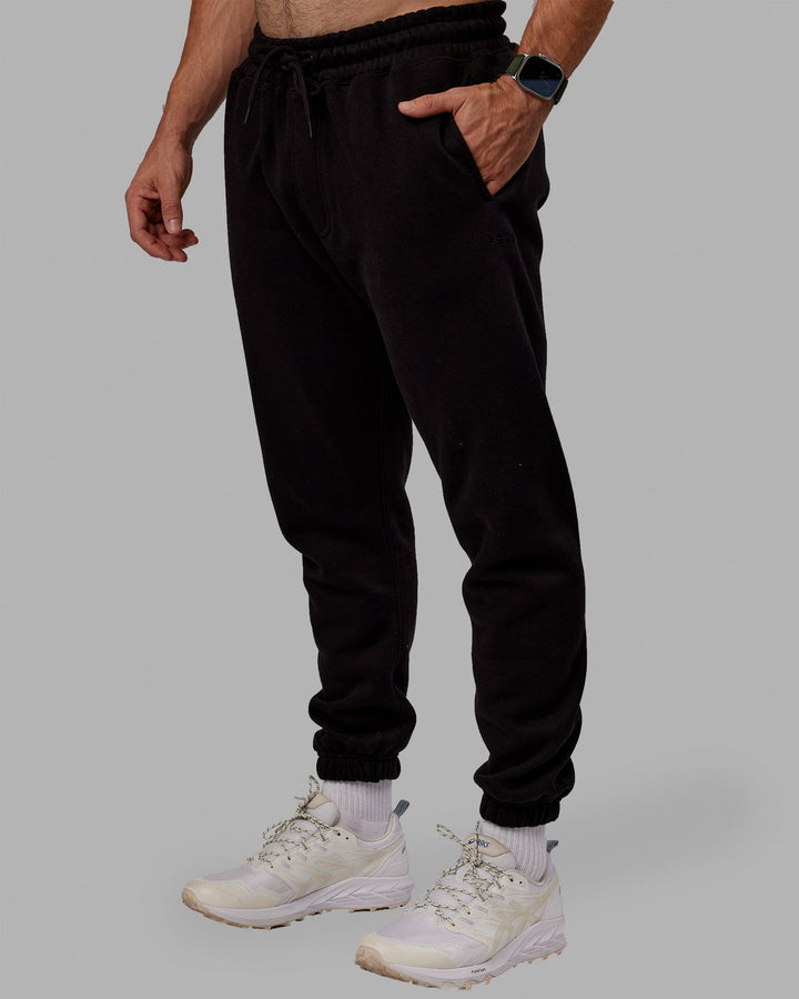 Man wearing MVP Track Pants - Black
