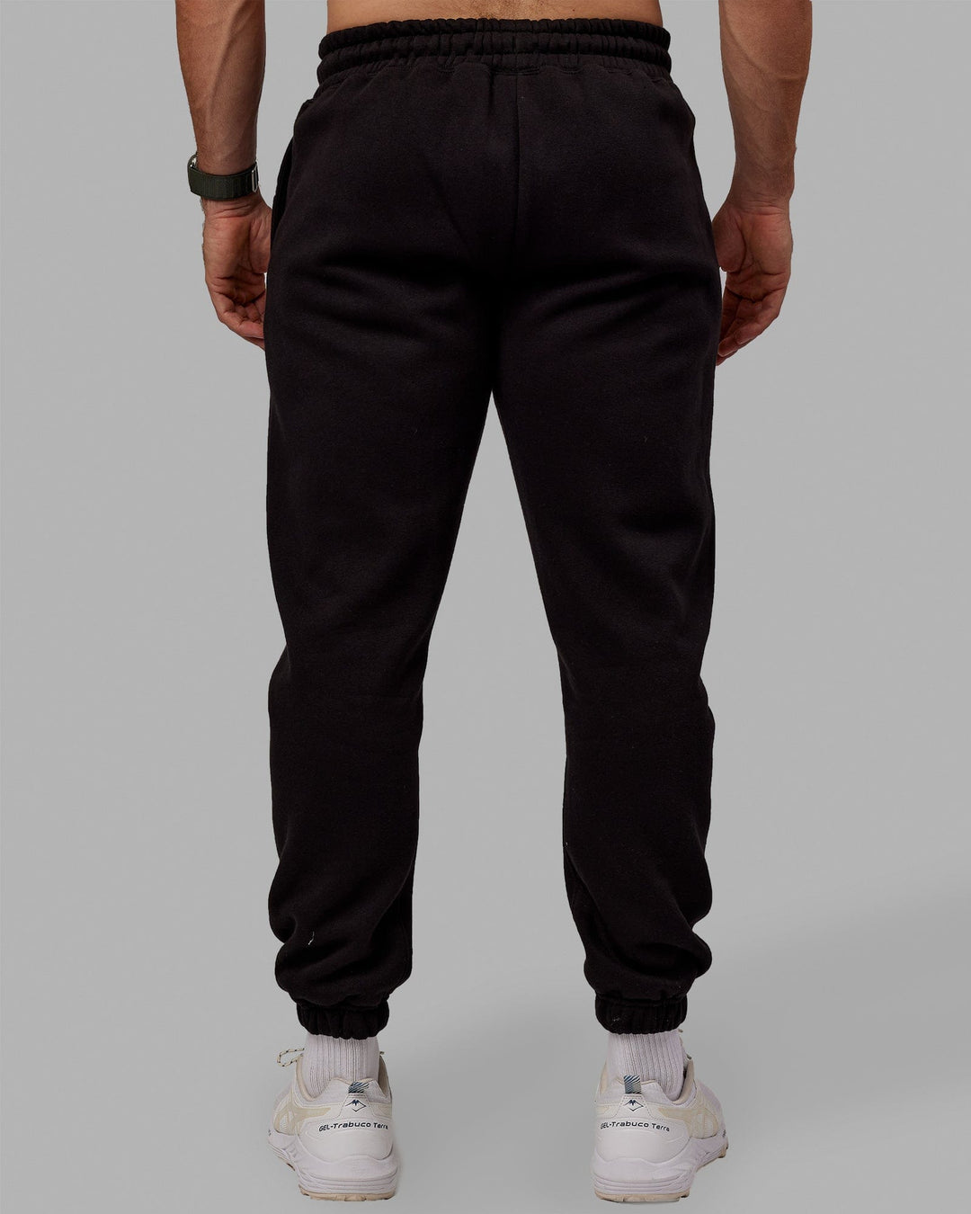 Man wearing MVP Track Pants - Black