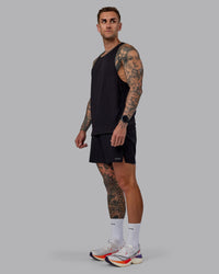 Man wearing Pace Keep on Running Tank - Black-Dahlia Purple