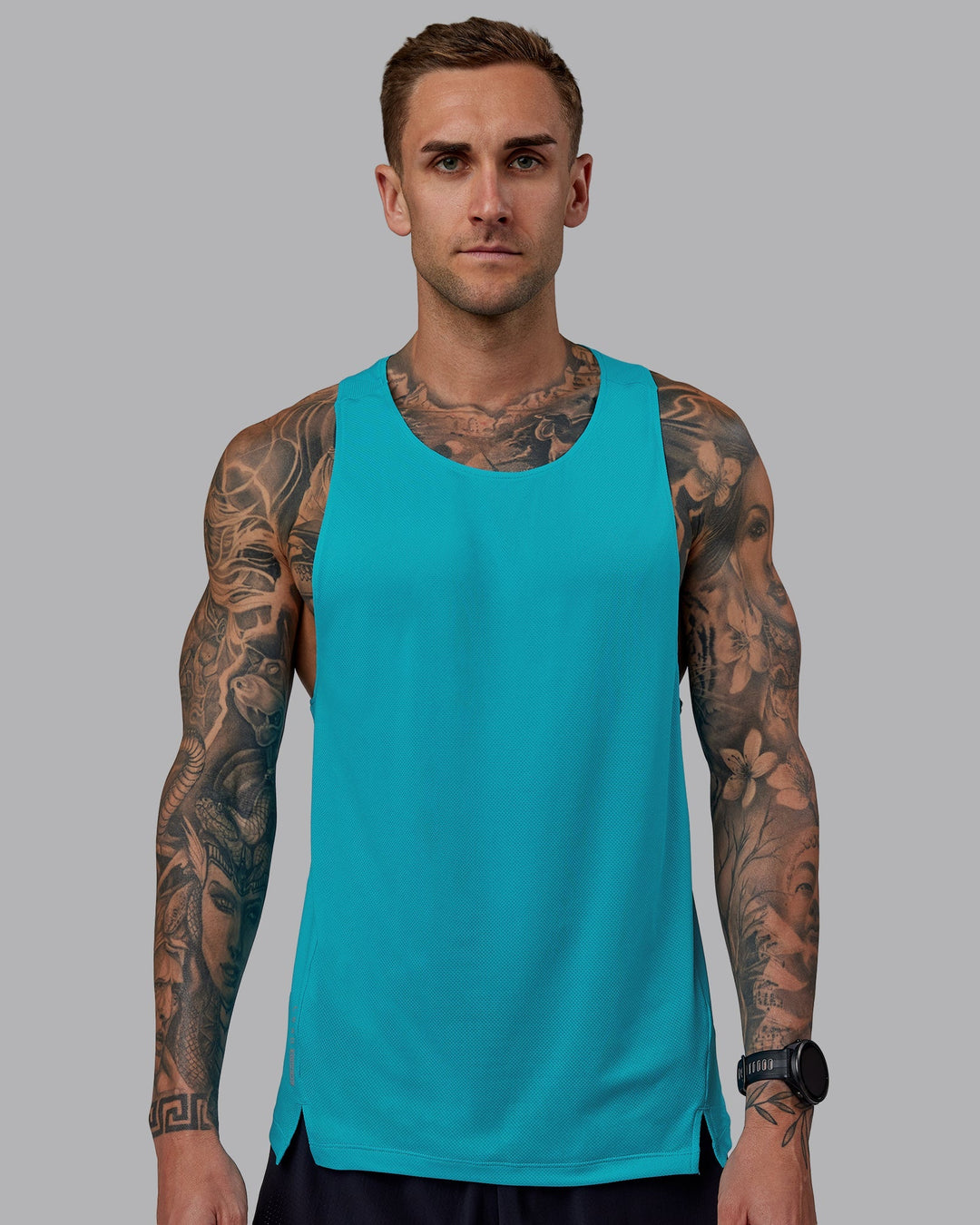 Man wearing Pace Running Tank - Blue Bird