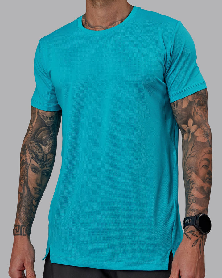 Man wearing Pace Running Tee - Blue Bird
