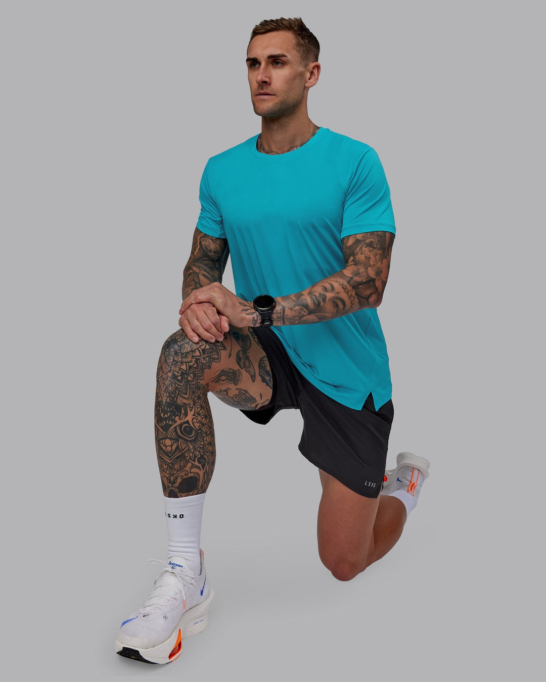 Man wearing Pace Running Tee - Blue Bird