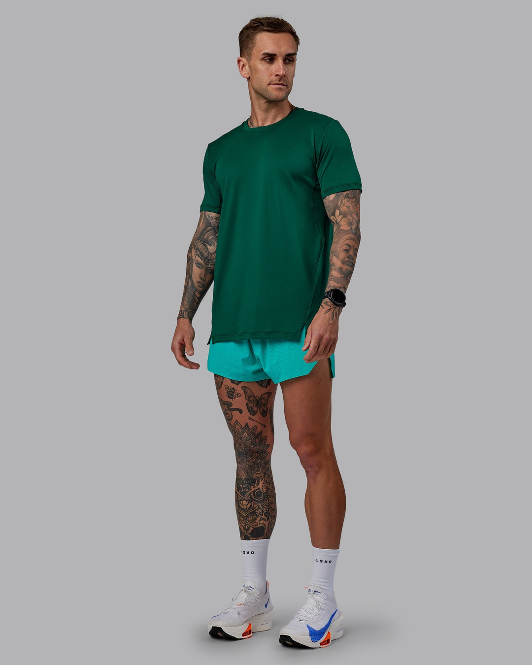 Man wearing Pace Running Tee - Malachite