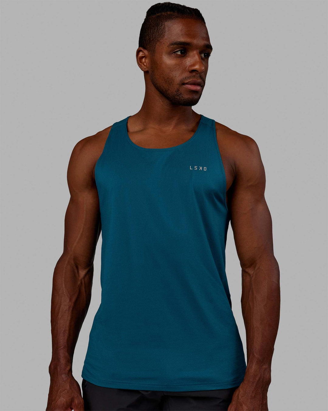 Man wearing Perform VapourFLX Tank - Deep Lagoon