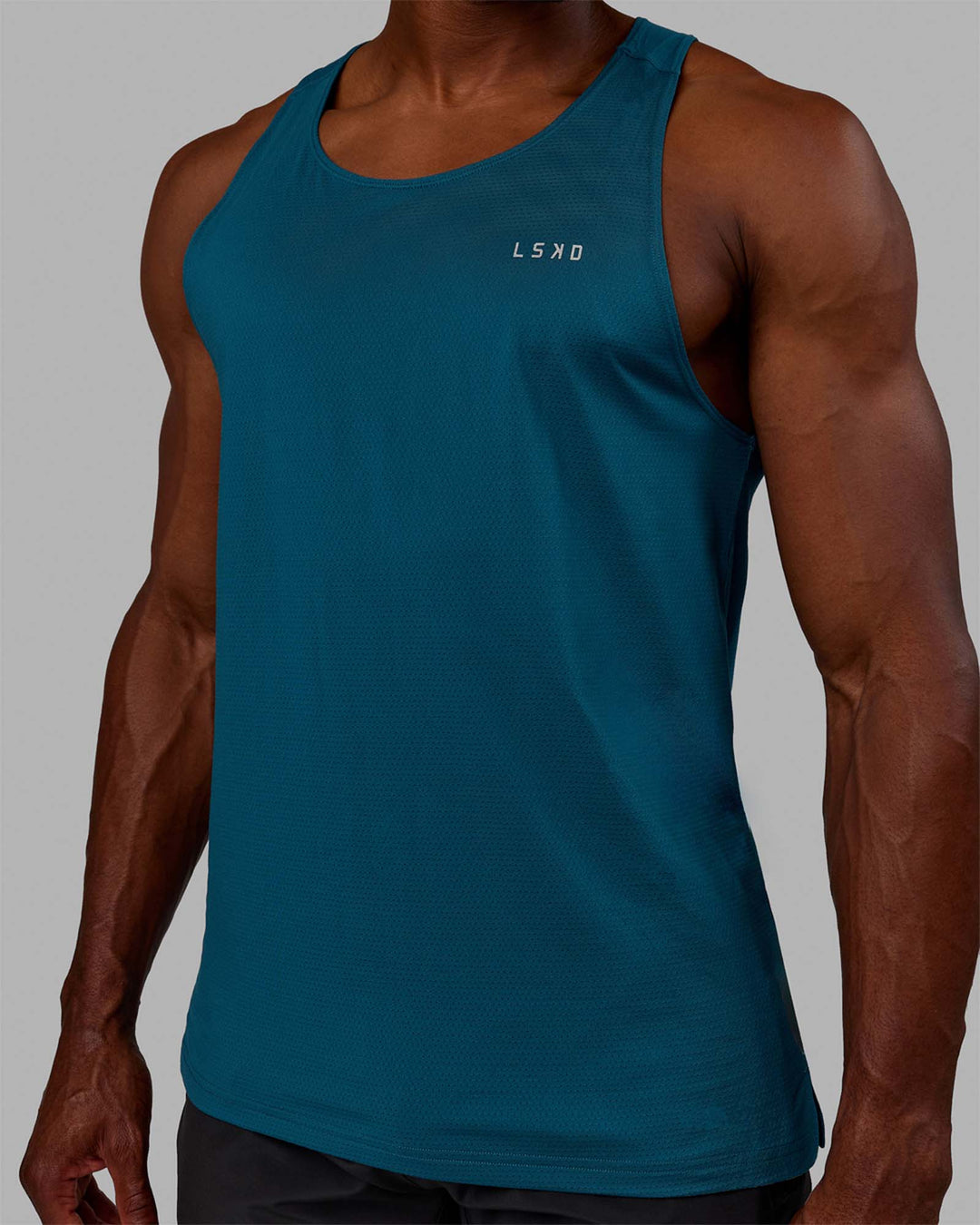 Man wearing Perform VapourFLX Tank - Deep Lagoon