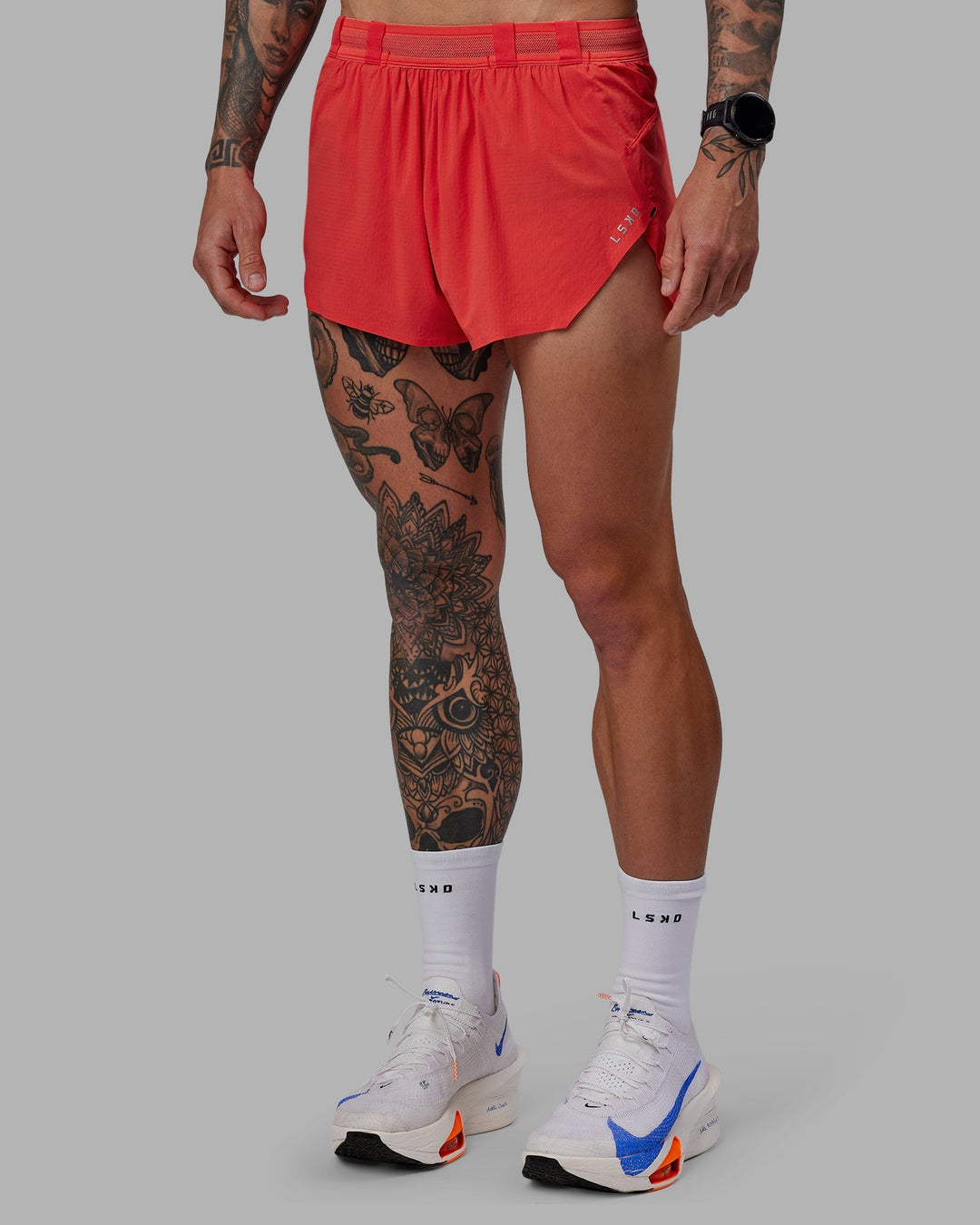 Man wearing Race Day 3&quot; Lined Running Shorts - Cayenne