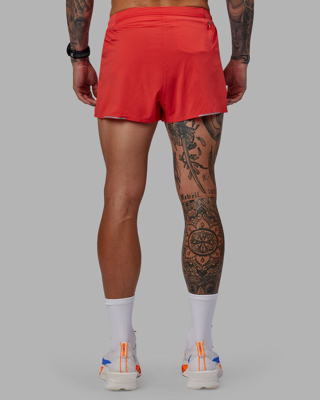 Man wearing Race Day 3&quot; Lined Running Shorts - Cayenne