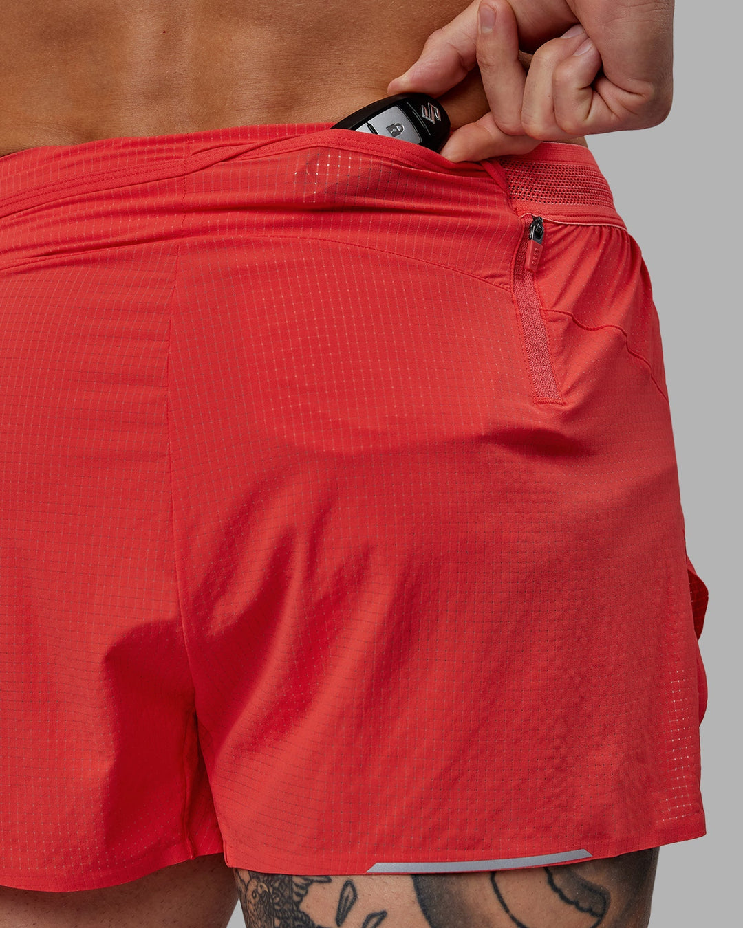 Man wearing Race Day 3&quot; Lined Running Shorts - Cayenne