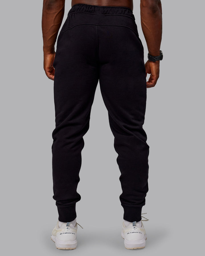 Man wearing Terry Track Pants - Black
