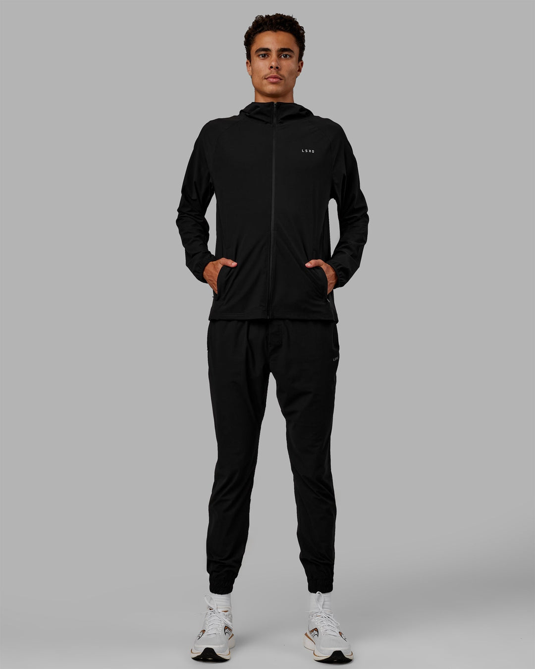 Man wearing Train-Lite FLXMAX Pants - Black