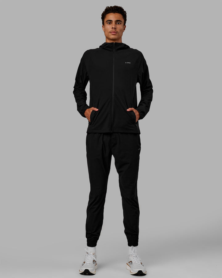 Man wearing Train-Lite FLXMAX Pants - Black
