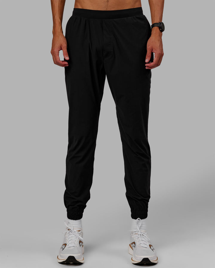 Man wearing Train-Lite FLXMAX Pants - Black
