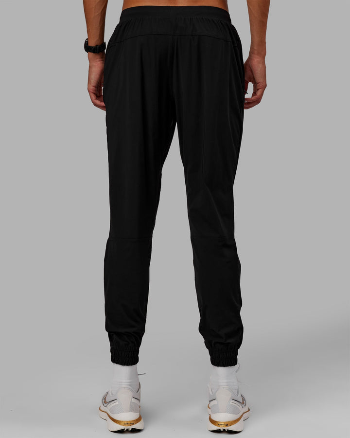 Man wearing Train-Lite FLXMAX Pants - Black
