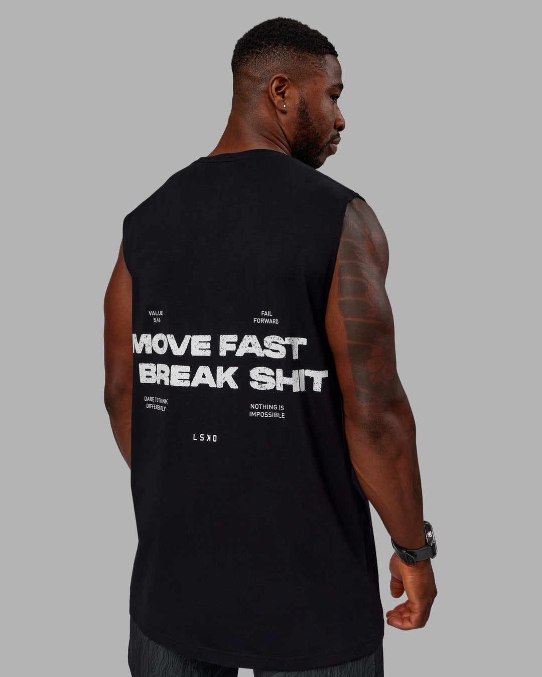 Man wearing Move Fast Value Series FLXCotton Tank - Black-White