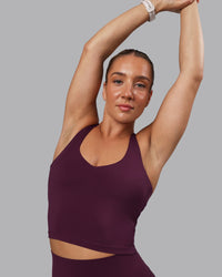 Woman wearing Movement Active Tank - Cherry Lacquer
