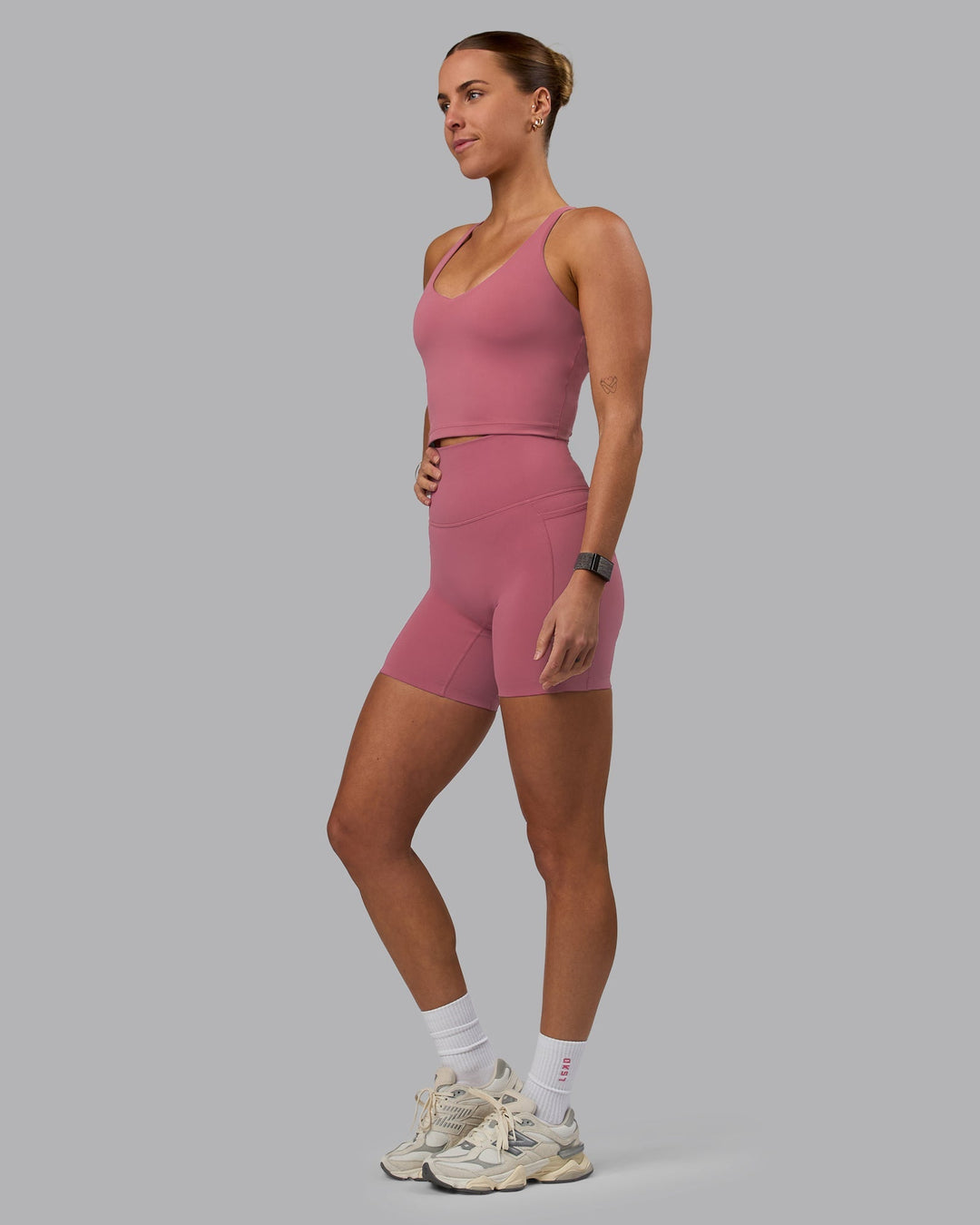 Woman wearing Movement Active Tank - Mauve Haze