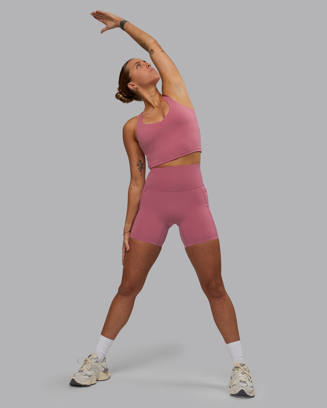 Woman wearing Movement Active Tank - Mauve Haze