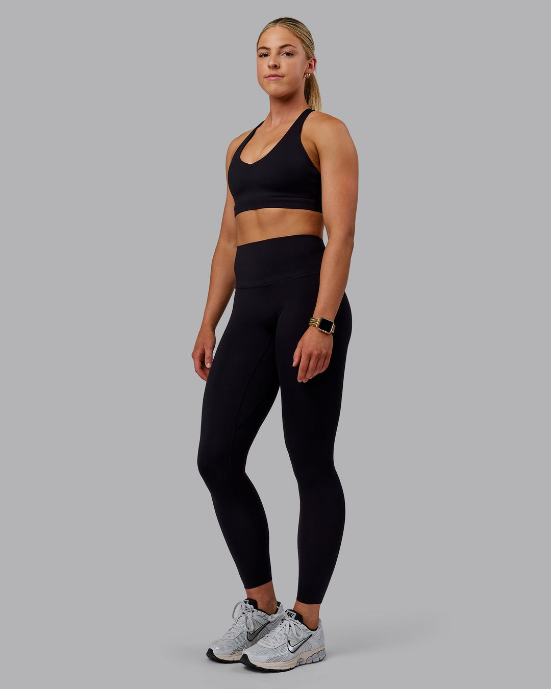 Woman wearing Nirvana Sports Bra - Black