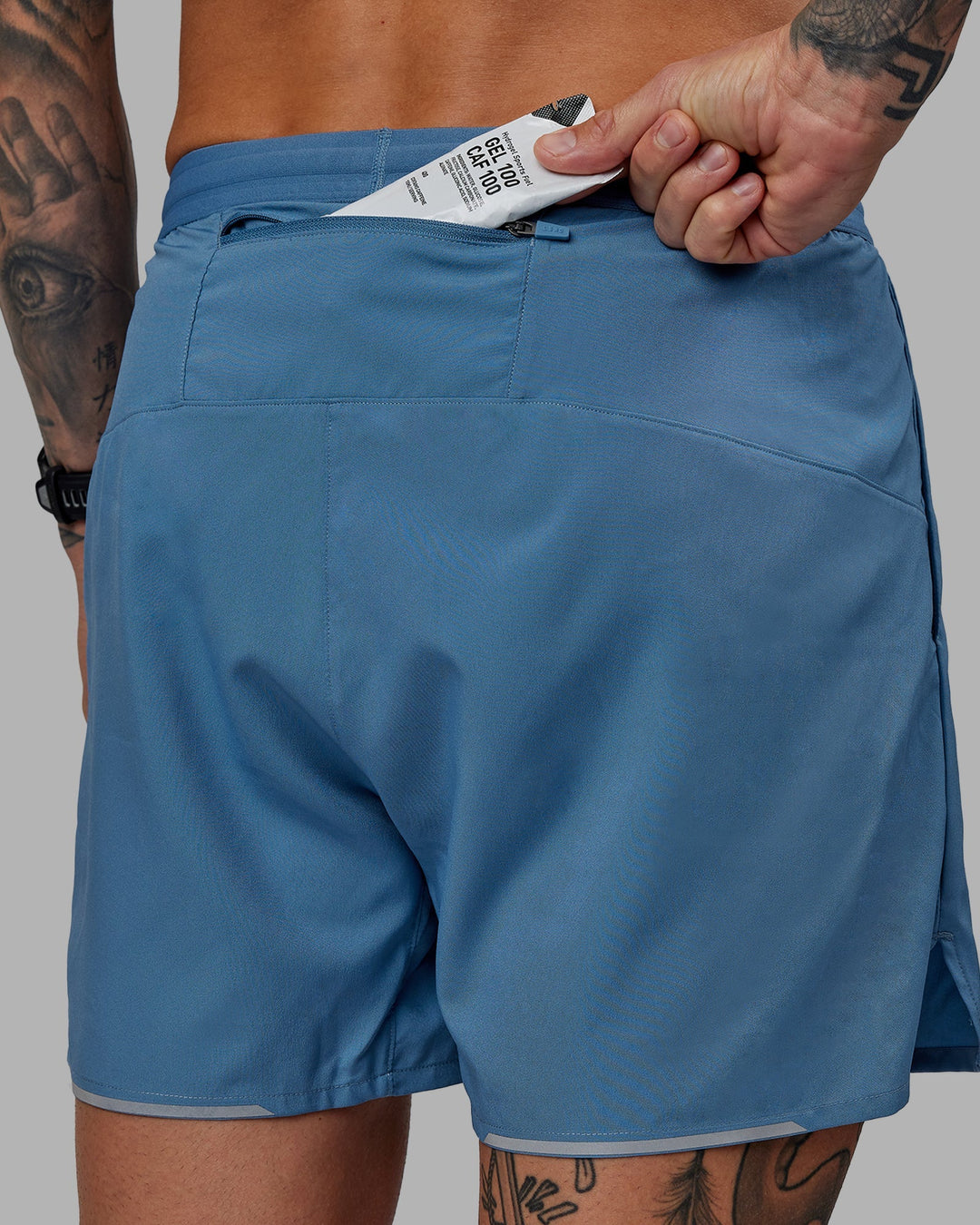 Man wearing Pace 5&quot; Lined Performance Shorts - Elemental Blue