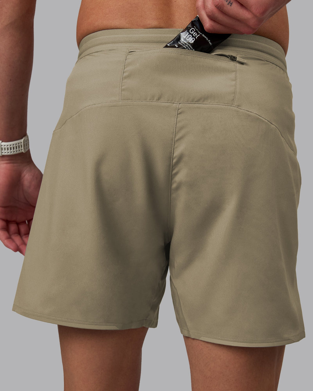 Man wearing Pace 5" Lined Performance Shorts - Elephant