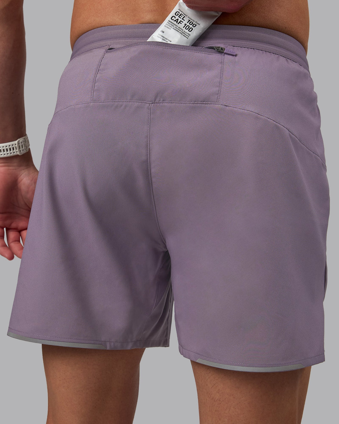 Man wearing Pace 5&quot; Lined Performance Shorts - Purple Sage