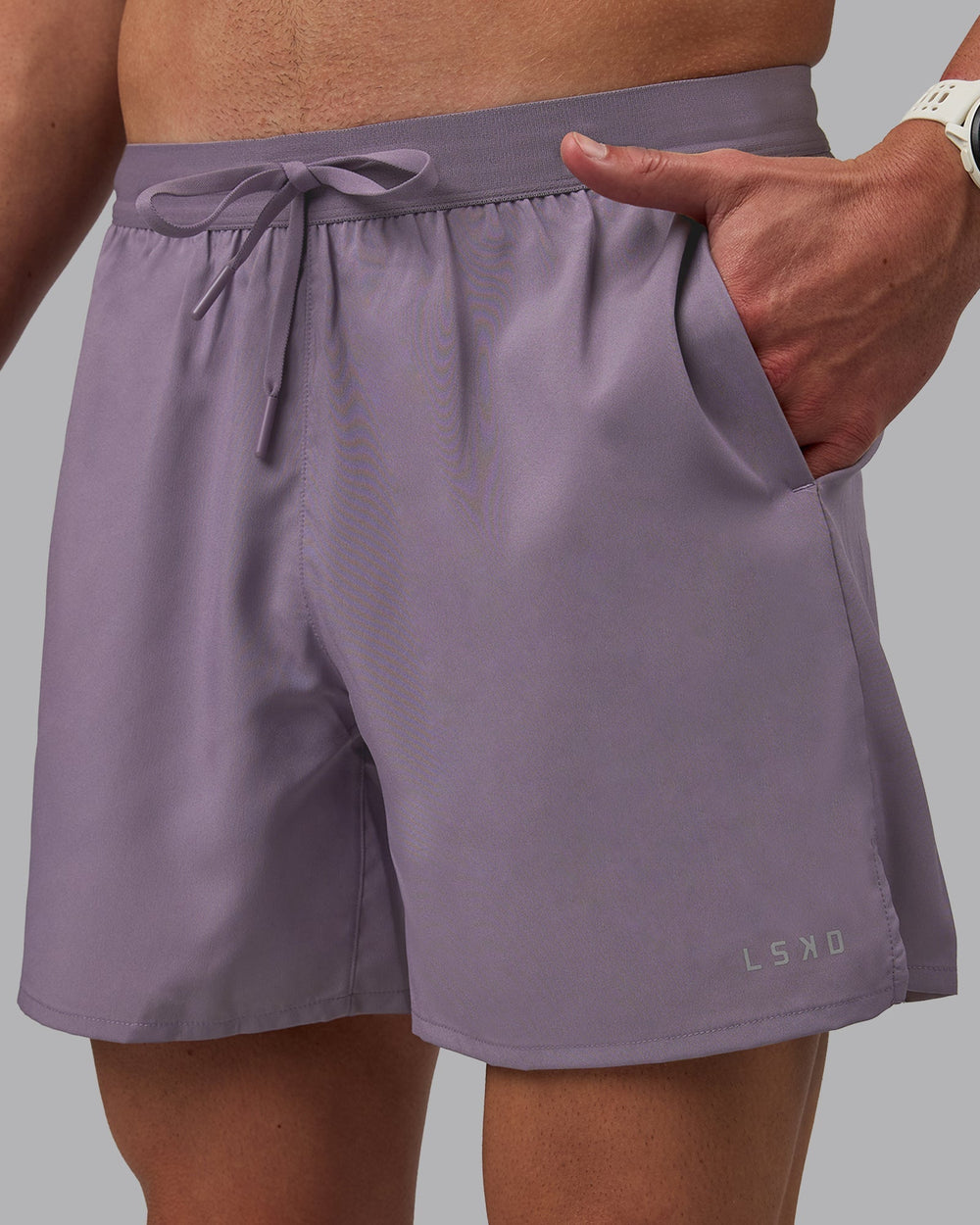 Man wearing Pace 5" Lined Performance Shorts - Purple Sage