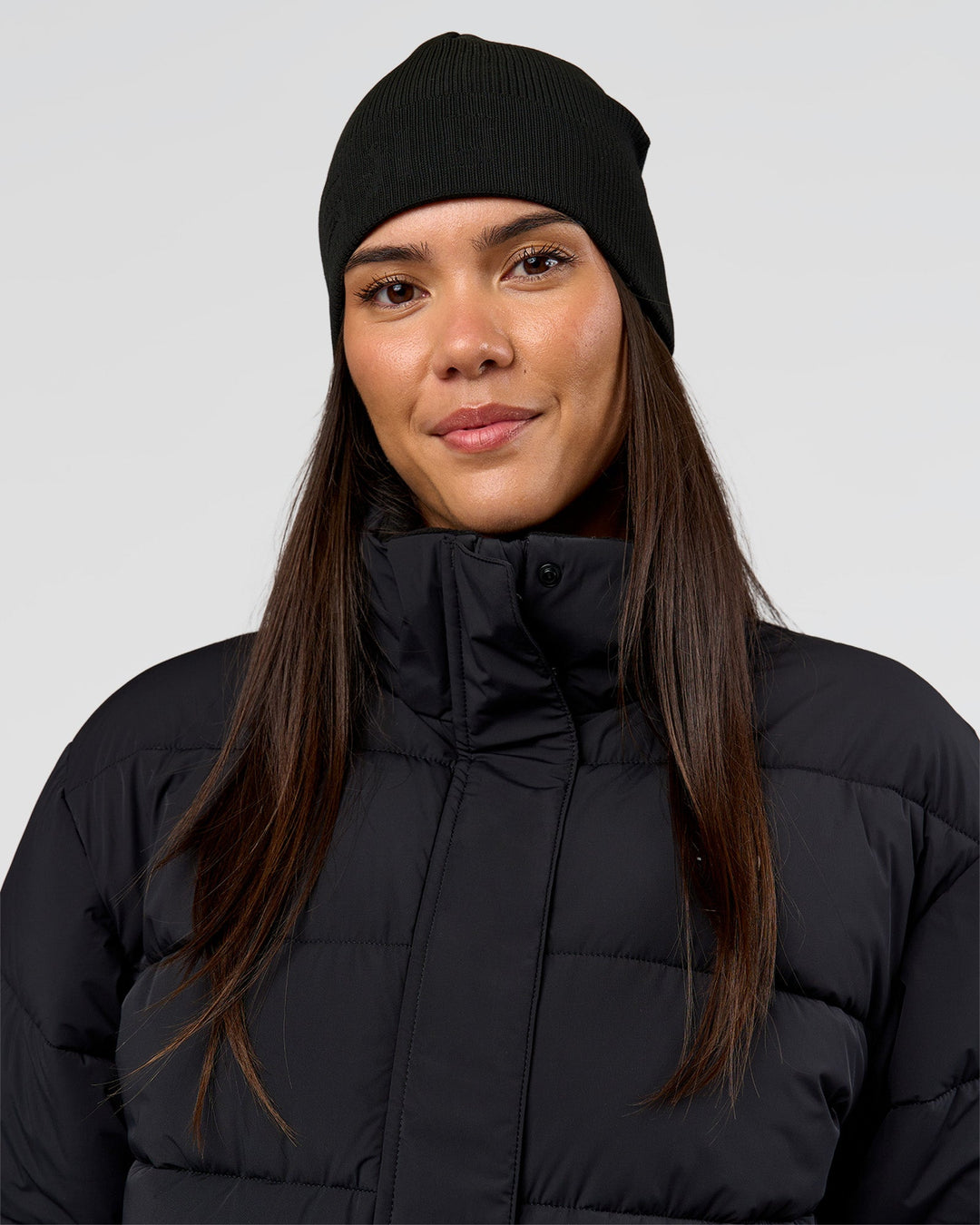 Woman wearing Pace Beanie in Black 