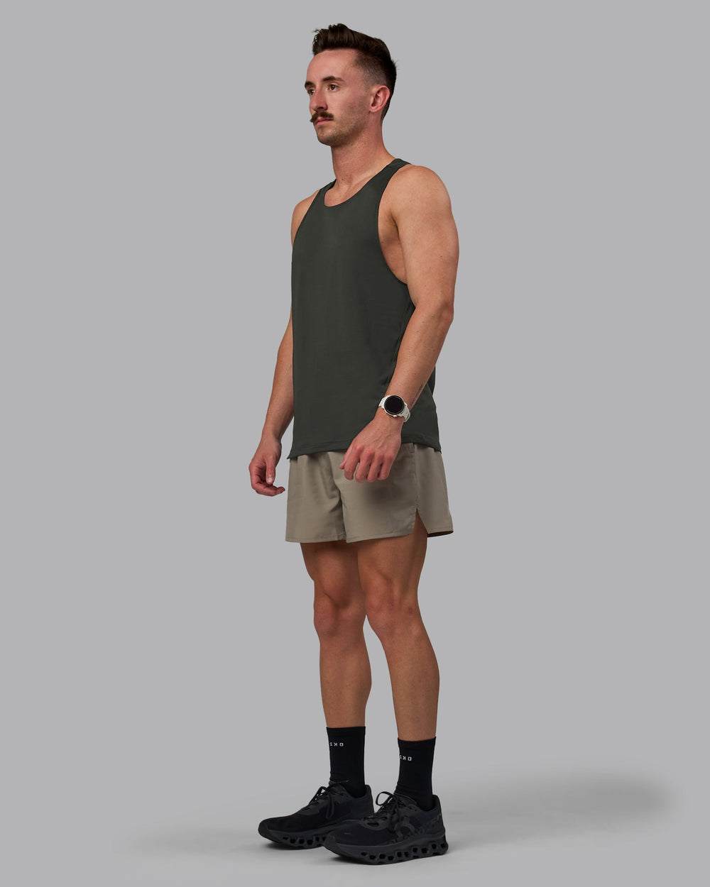 Man wearing Pace Running Tank - Pirate Black