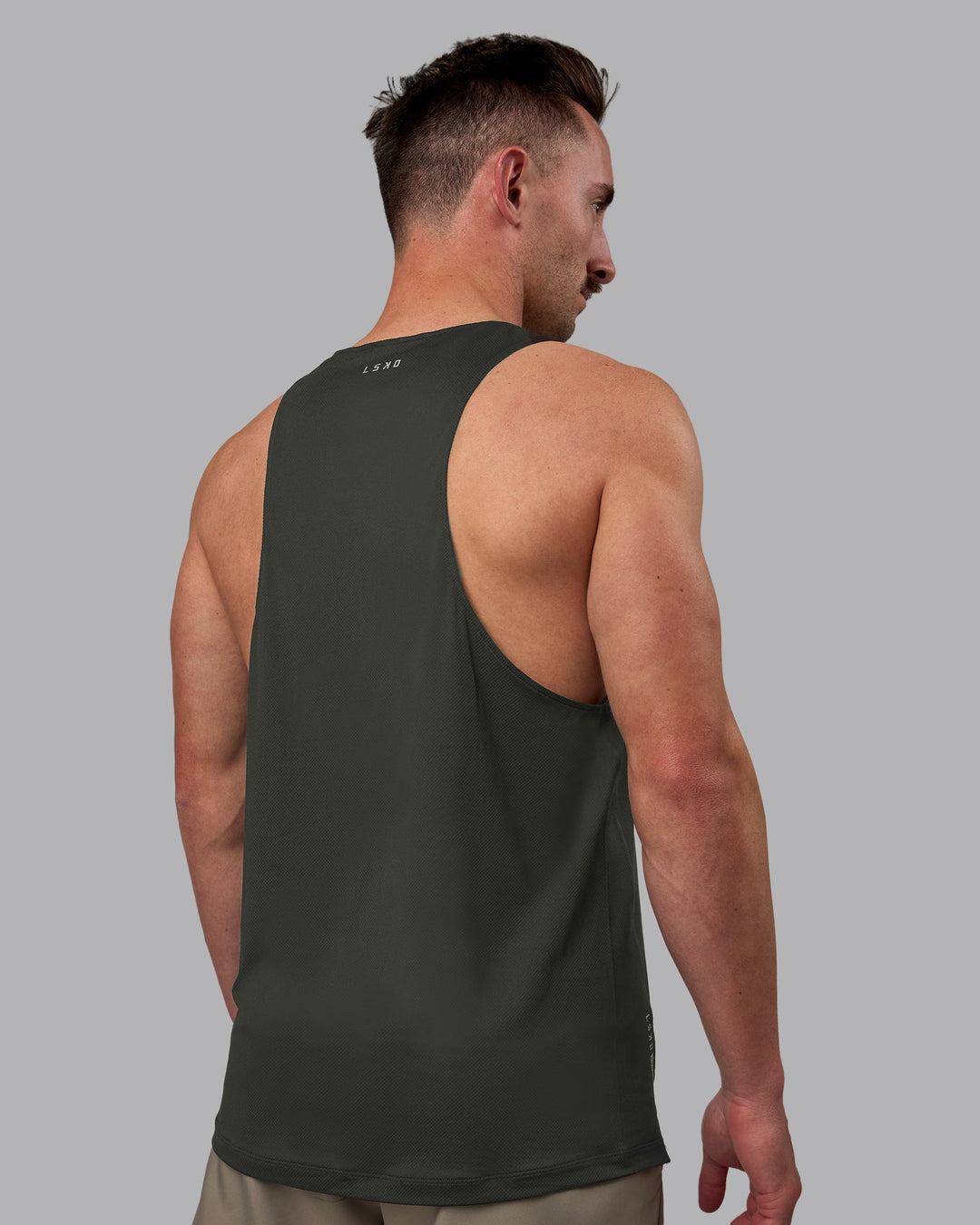 Man wearing Pace Running Tank - Pirate Black