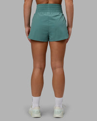 Woman wearing Power Train 2" Shorts - Sagebrush