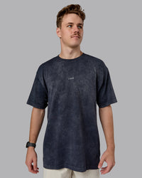 Man wearing Power Oversized Tee - Pirate Black Washed |Model:Cameron | Size:M