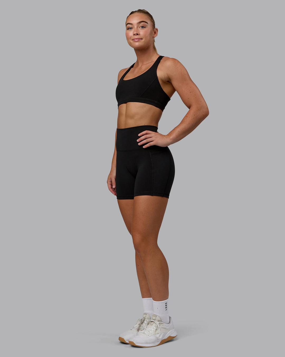 Woman wearing Precision Sports Bra - Black