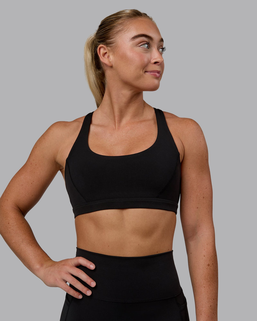 Woman wearing Precision Sports Bra - Black