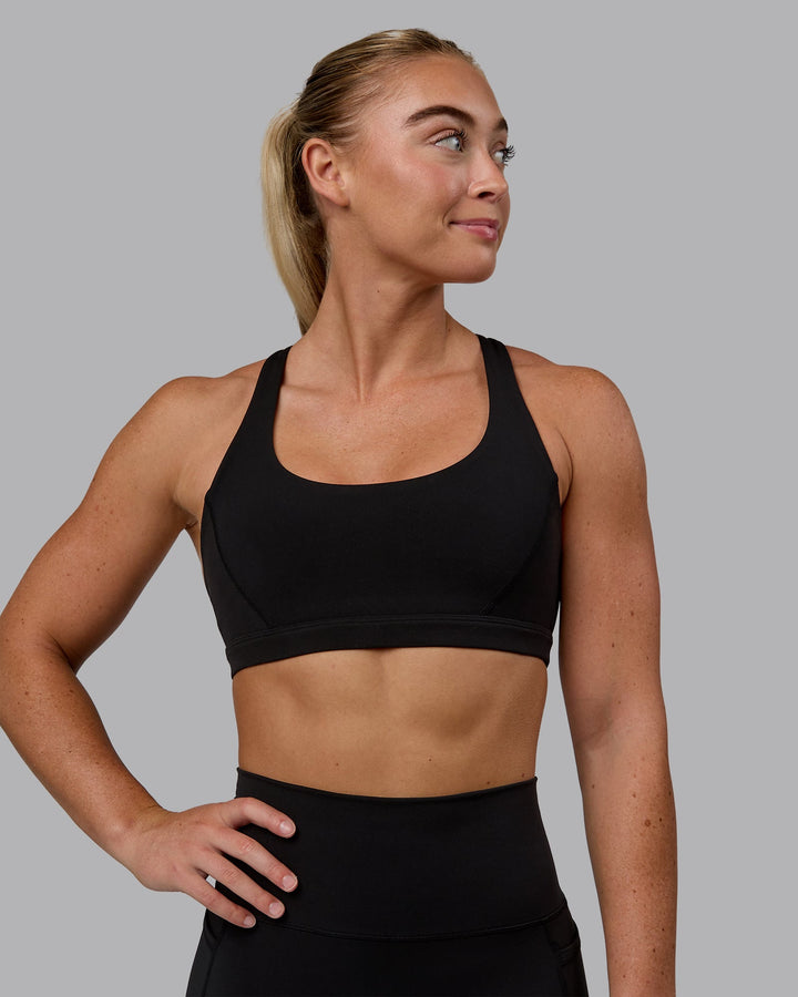 Woman wearing Precision Sports Bra - Black
