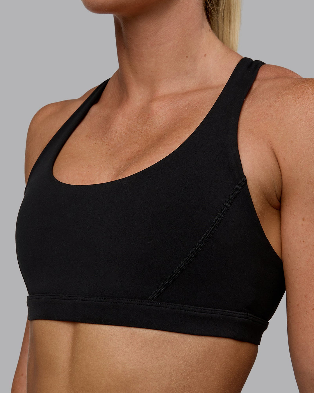 Woman wearing Precision Sports Bra - Black