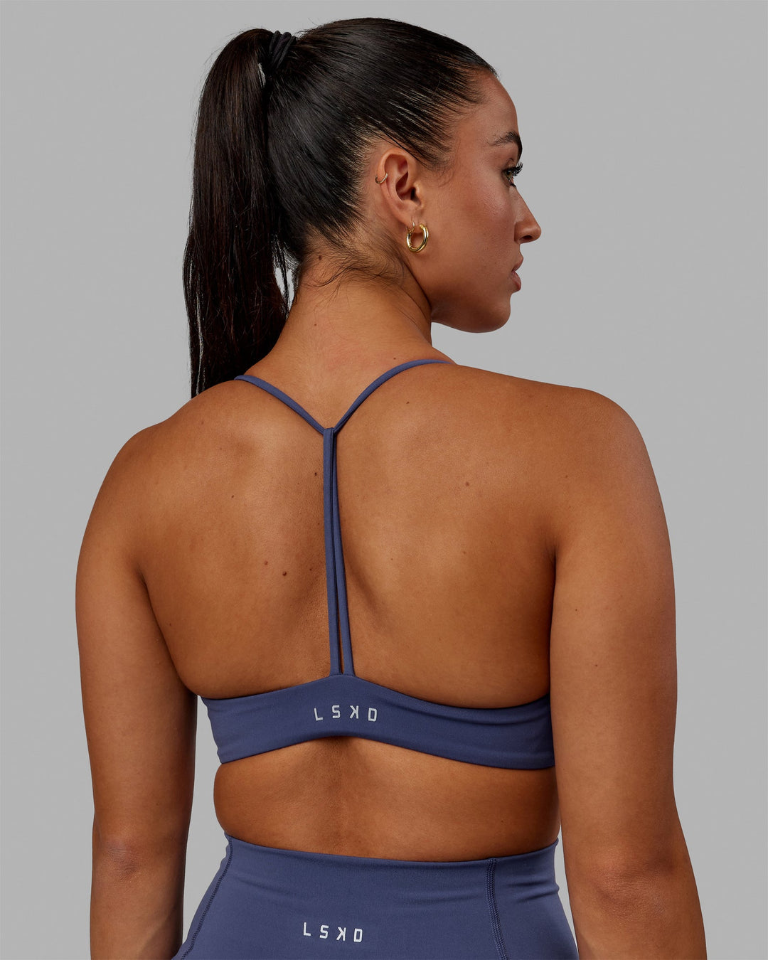 Woman wearing Progression Bra - Future Dusk