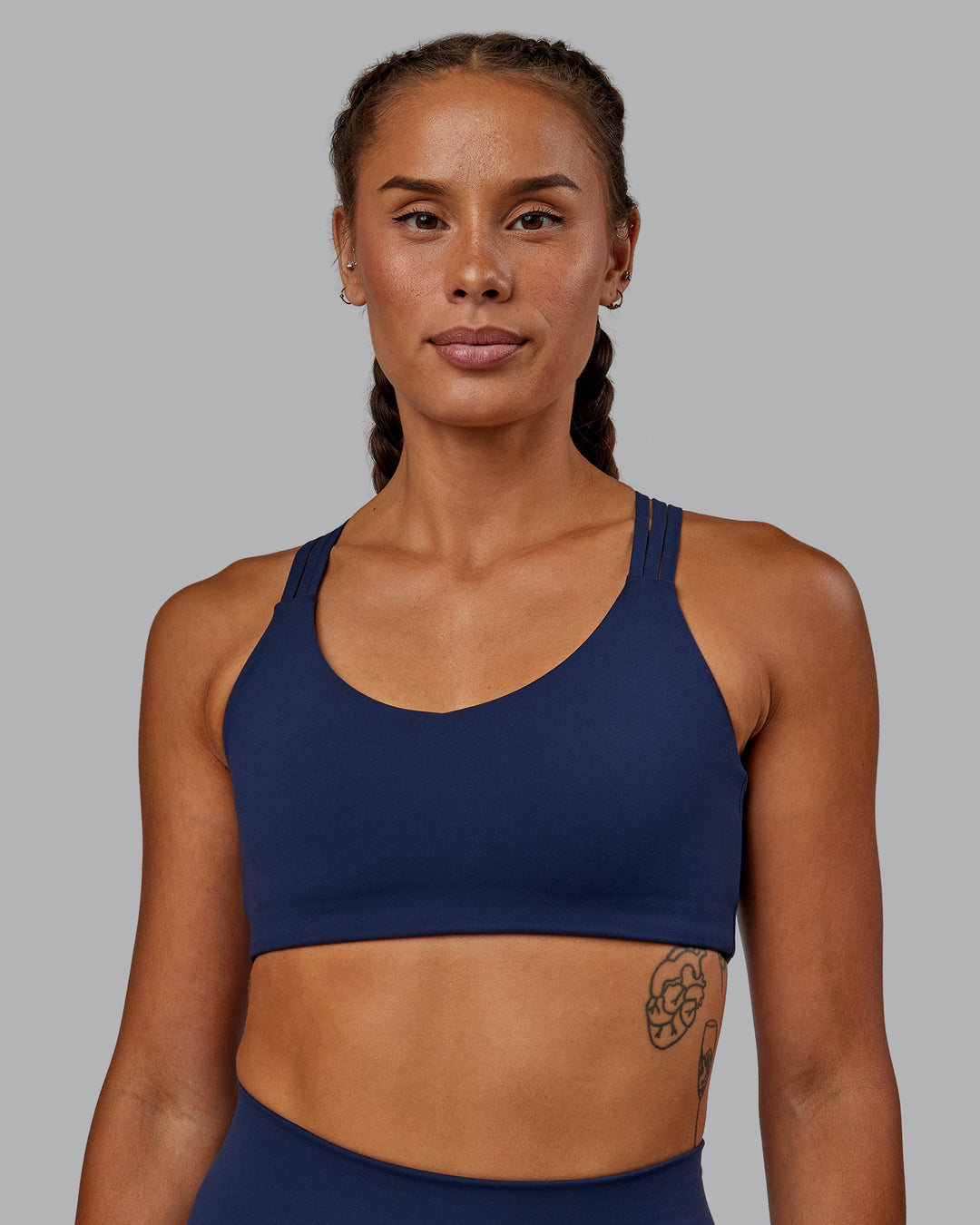 Woman wearing Push The Limit Sports Bra - Future Navy