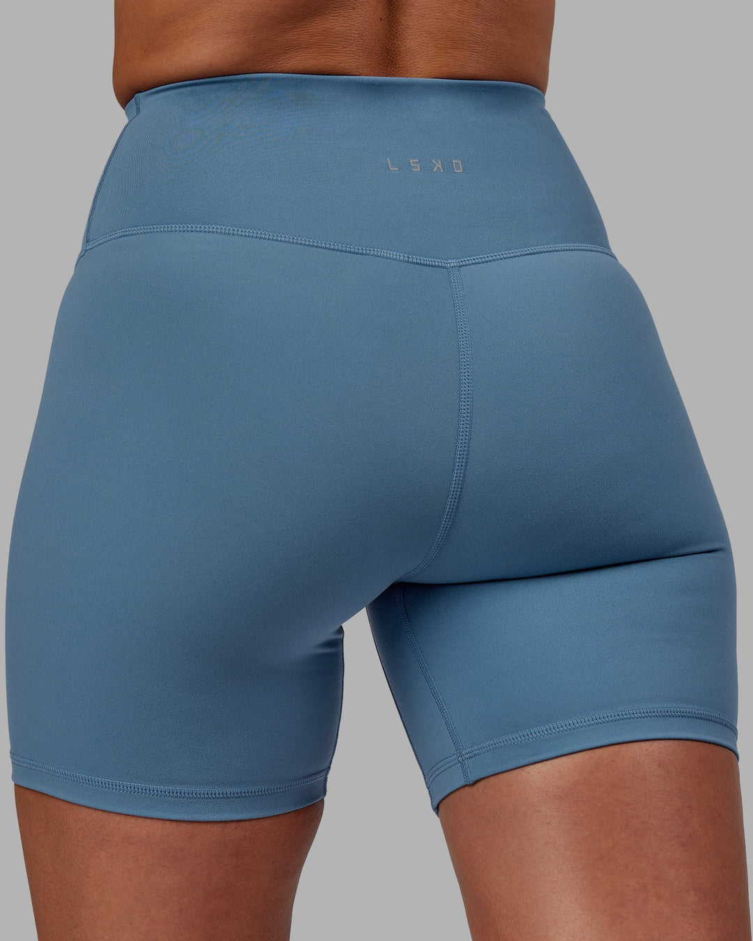 Woman wearing RXD High Waist Mid-Length Shorts - Elemental Blue