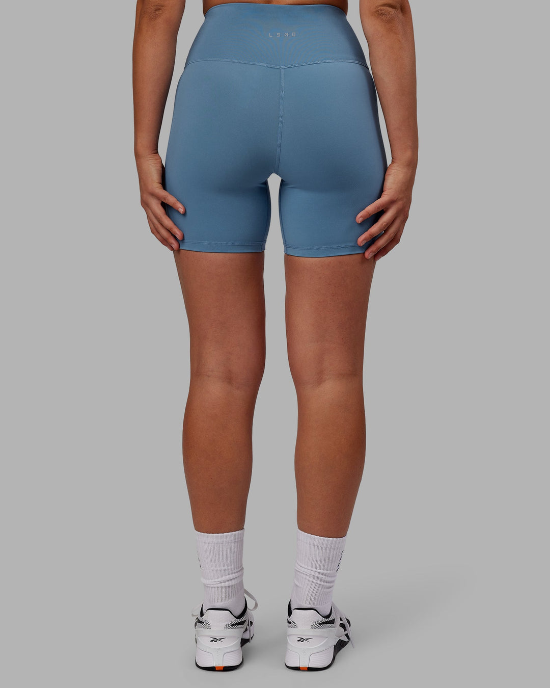 Woman wearing RXD High Waist Mid-Length Shorts - Elemental Blue