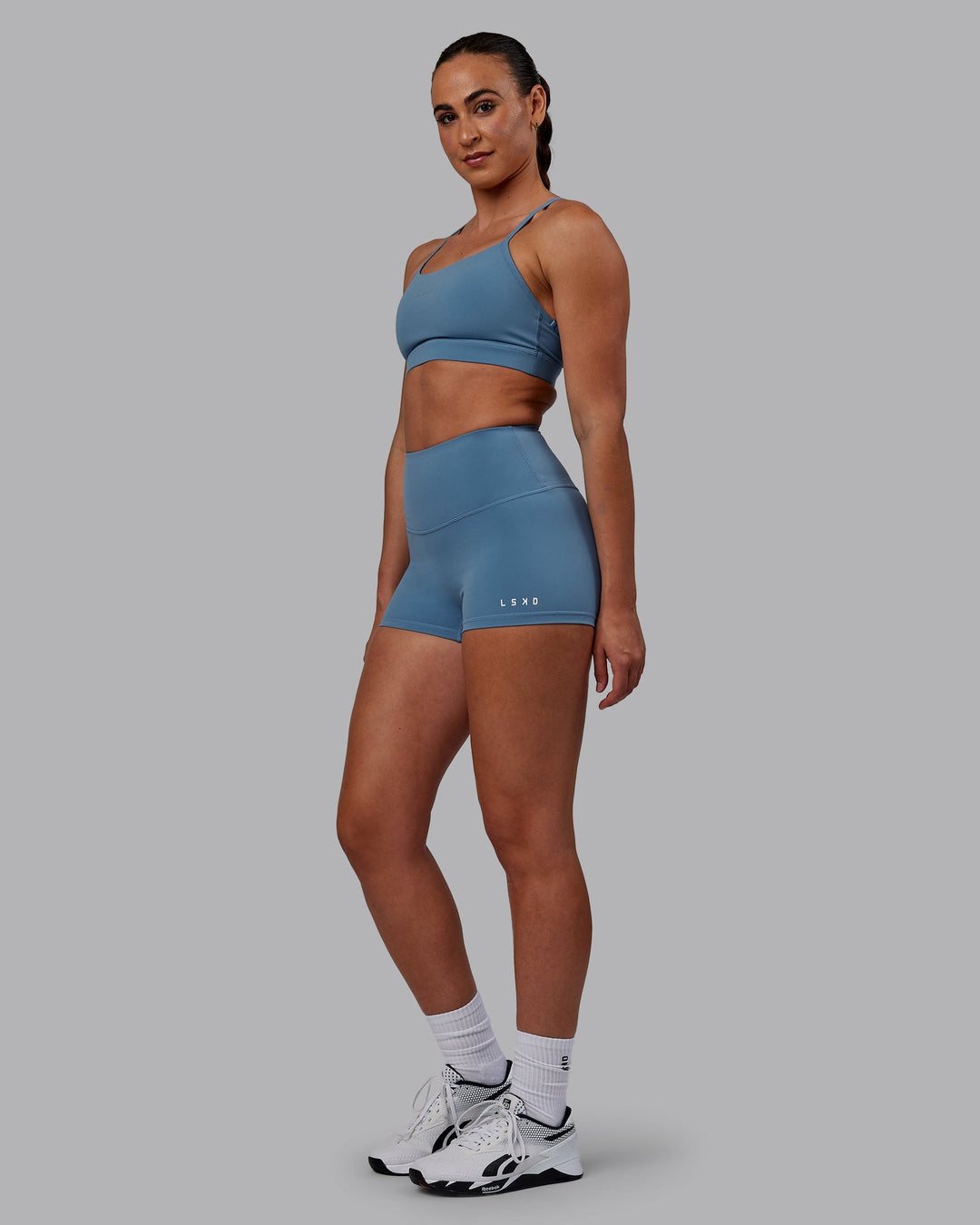 Woman wearing RXD High Waist Micro Shorts - Elemental Blue