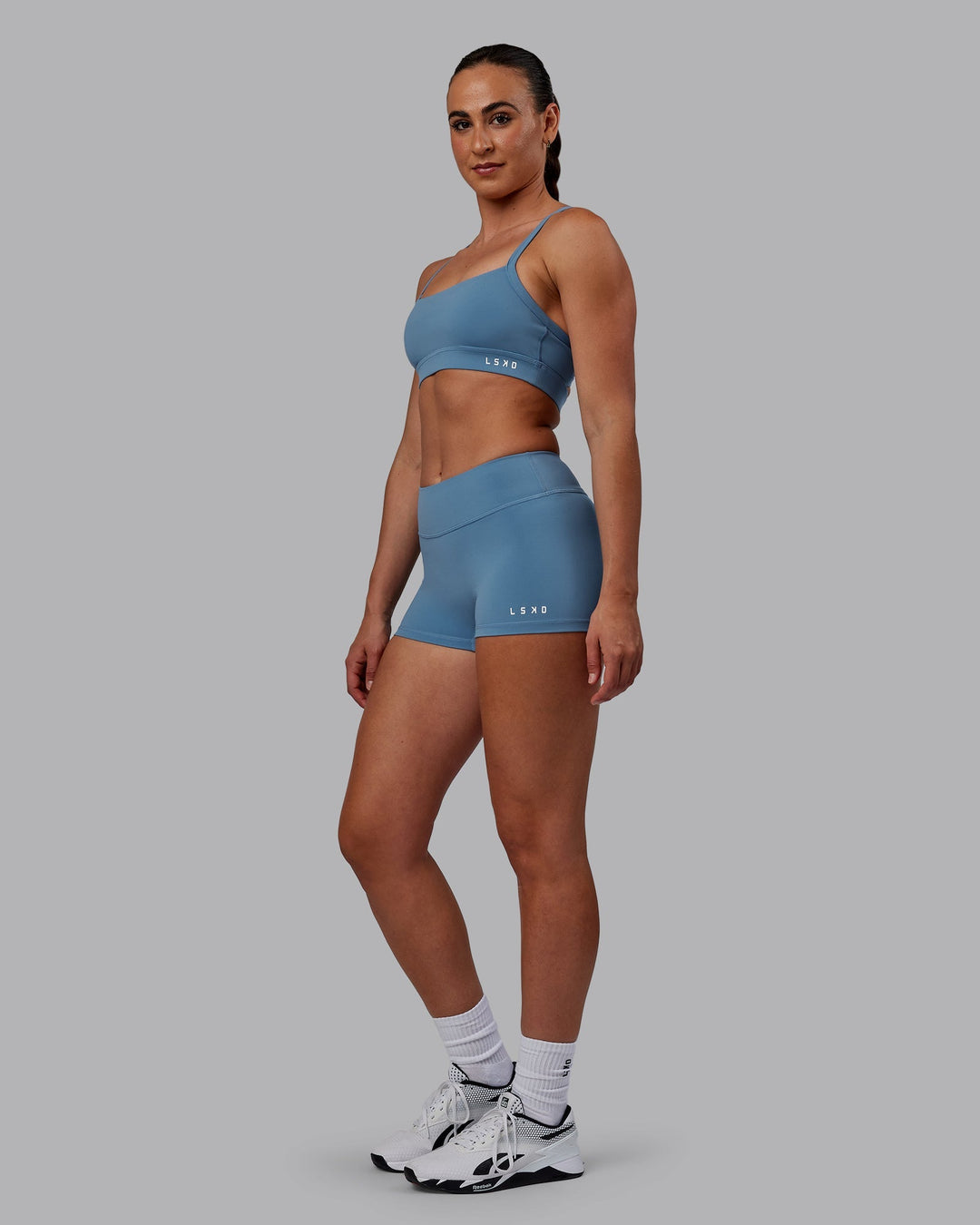 Woman wearing RXD Micro Shorts - Elemental Blue