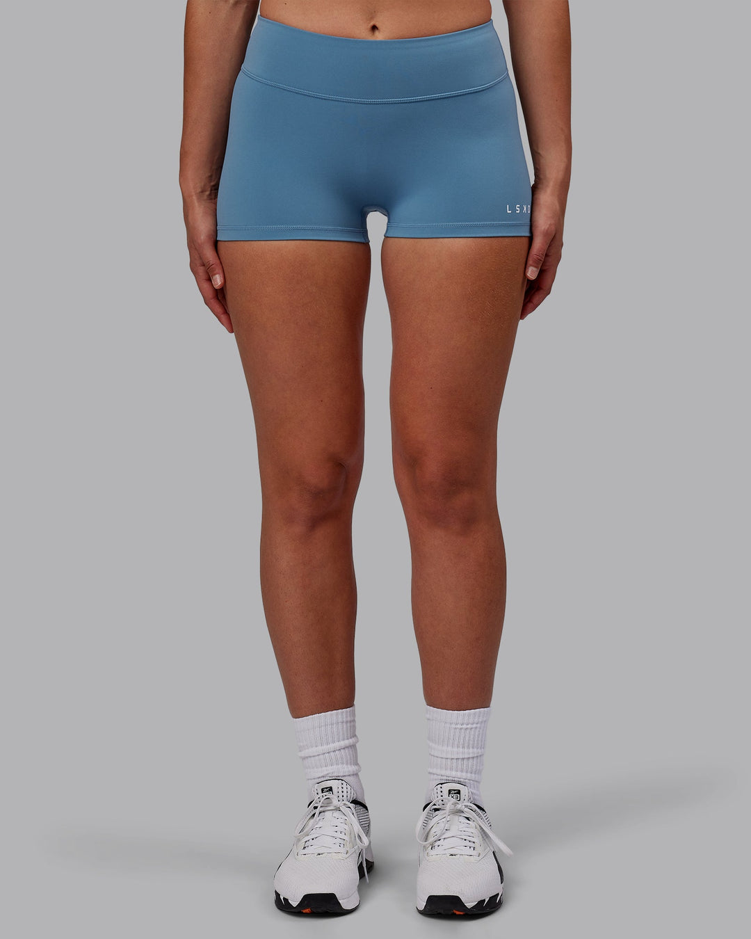 Woman wearing RXD Micro Shorts - Elemental Blue