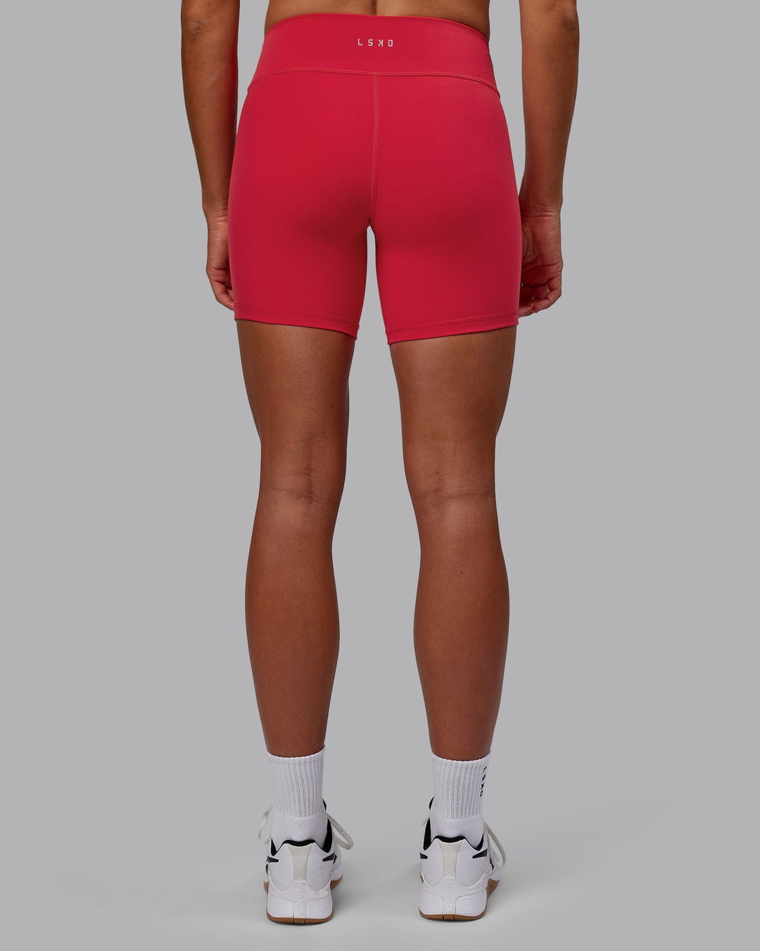 Woman wearing RXD Mid-Length Shorts - Scarlet