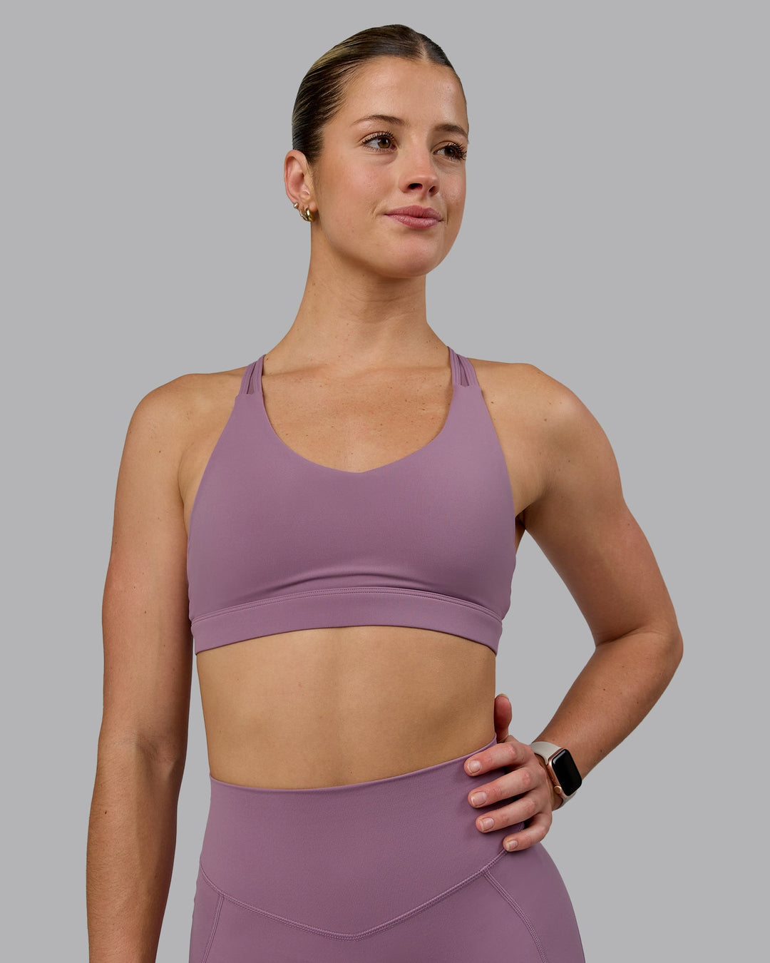 Woman wearing Radiance Sports Bra - Grape