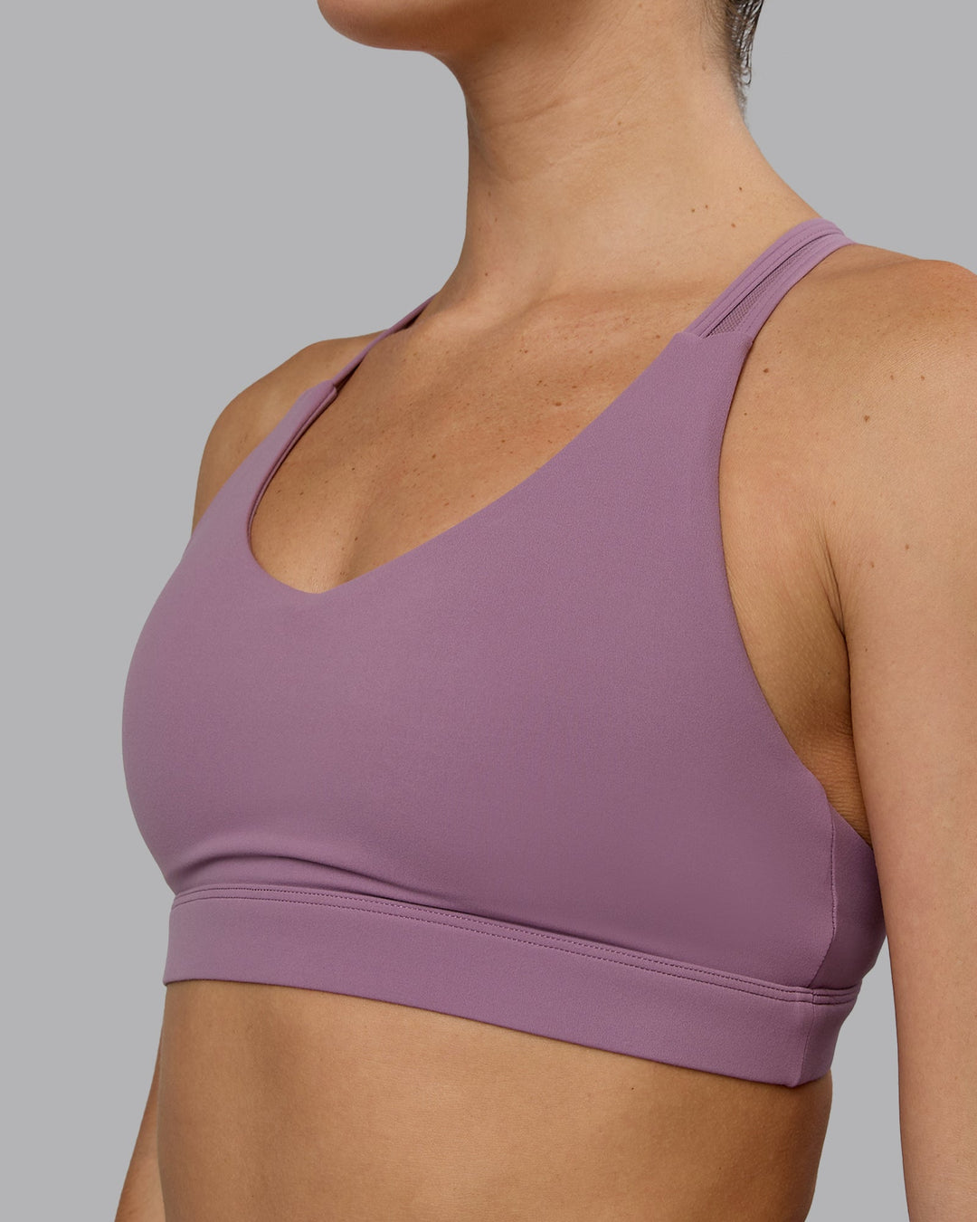 Woman wearing Radiance Sports Bra - Grape