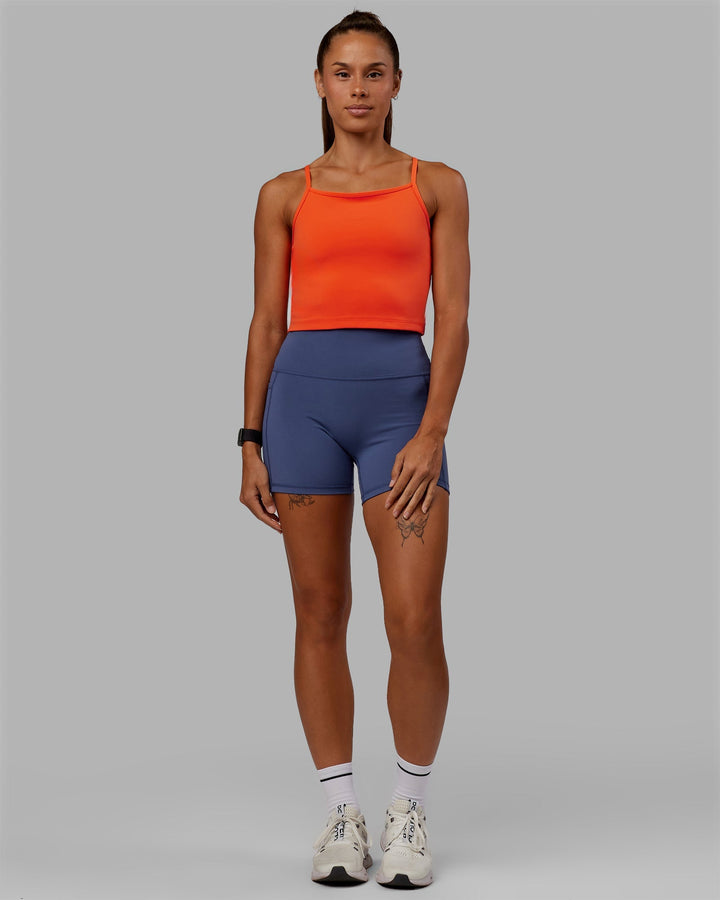 Woman wearing Rapid Active Tank - Ultra Orange