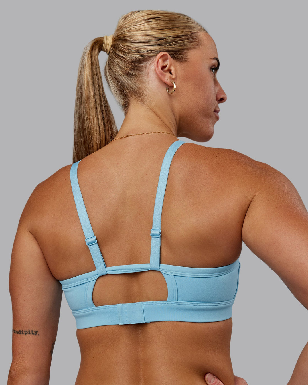 Woman wearing Rapid Sports Bra - Sky Blue