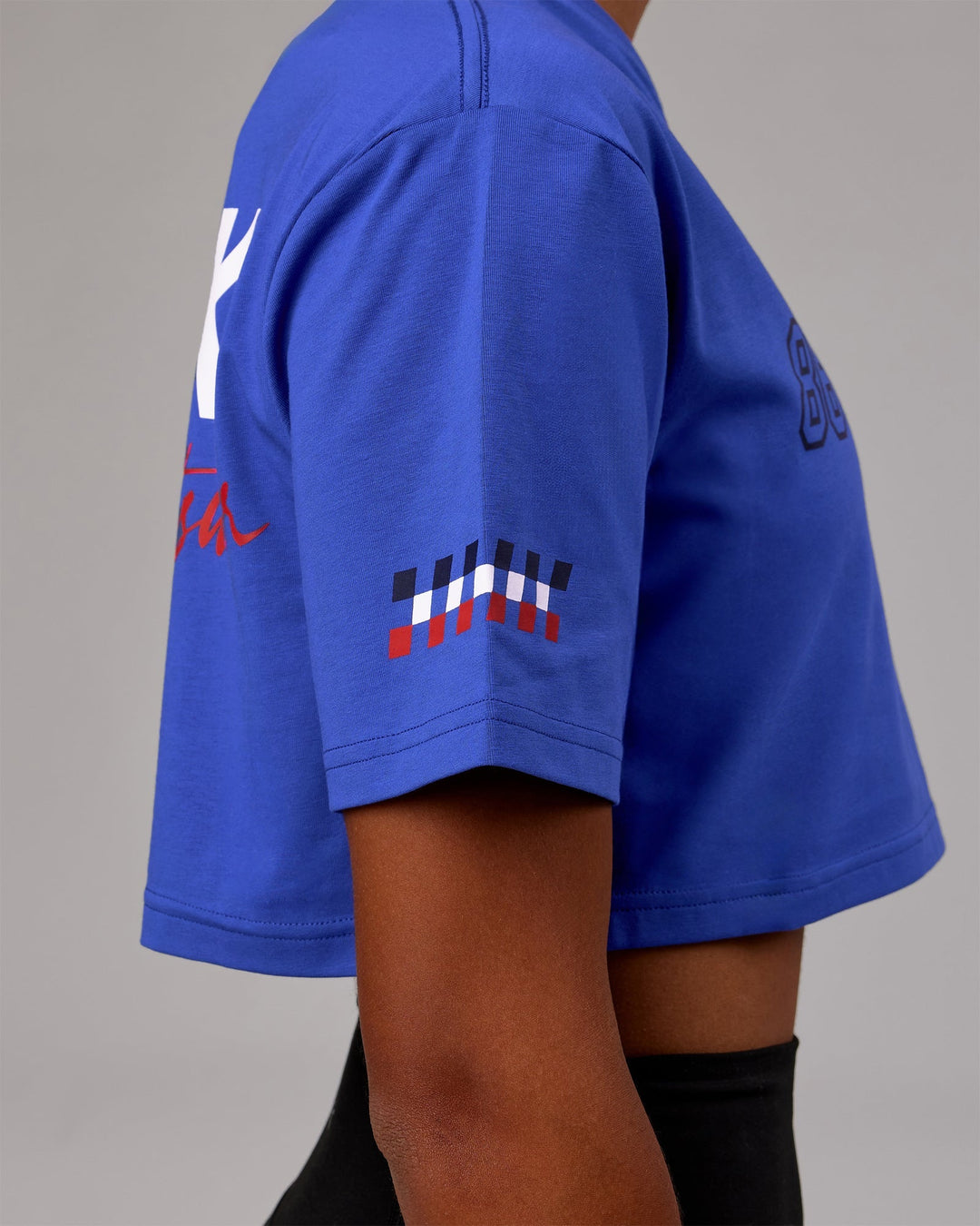 Woman wearing Redline FLXCotton Cropped Tee - Power Cobalt-White