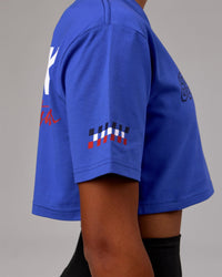 Woman wearing Redline FLXCotton Cropped Tee - Power Cobalt-White