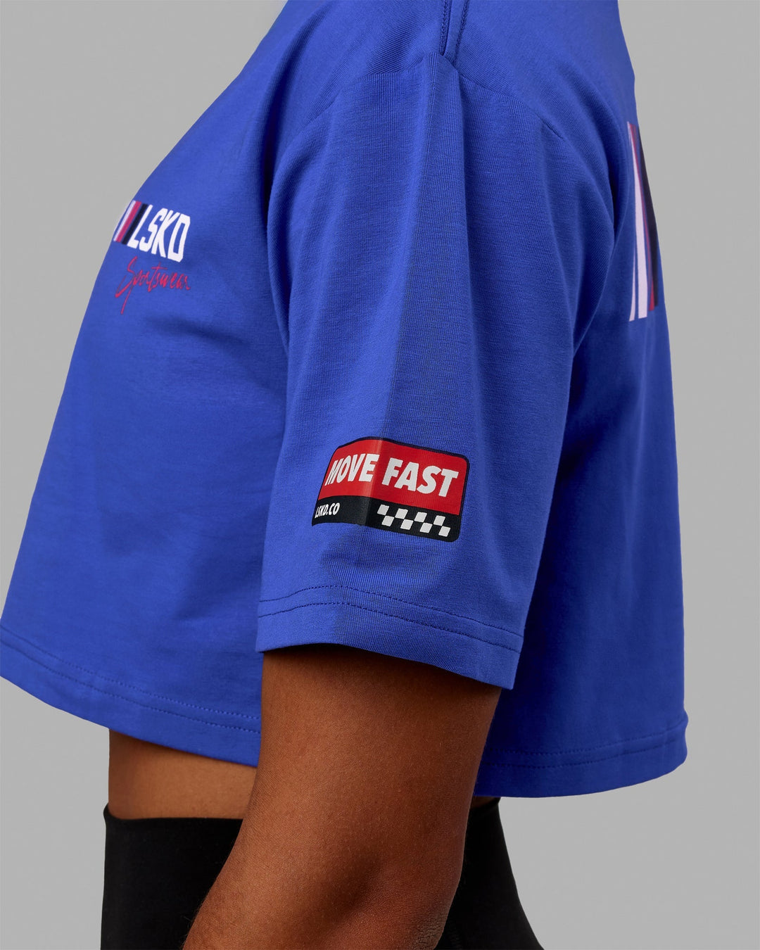 Woman wearing Redline FLXCotton Cropped Tee - Power Cobalt-White